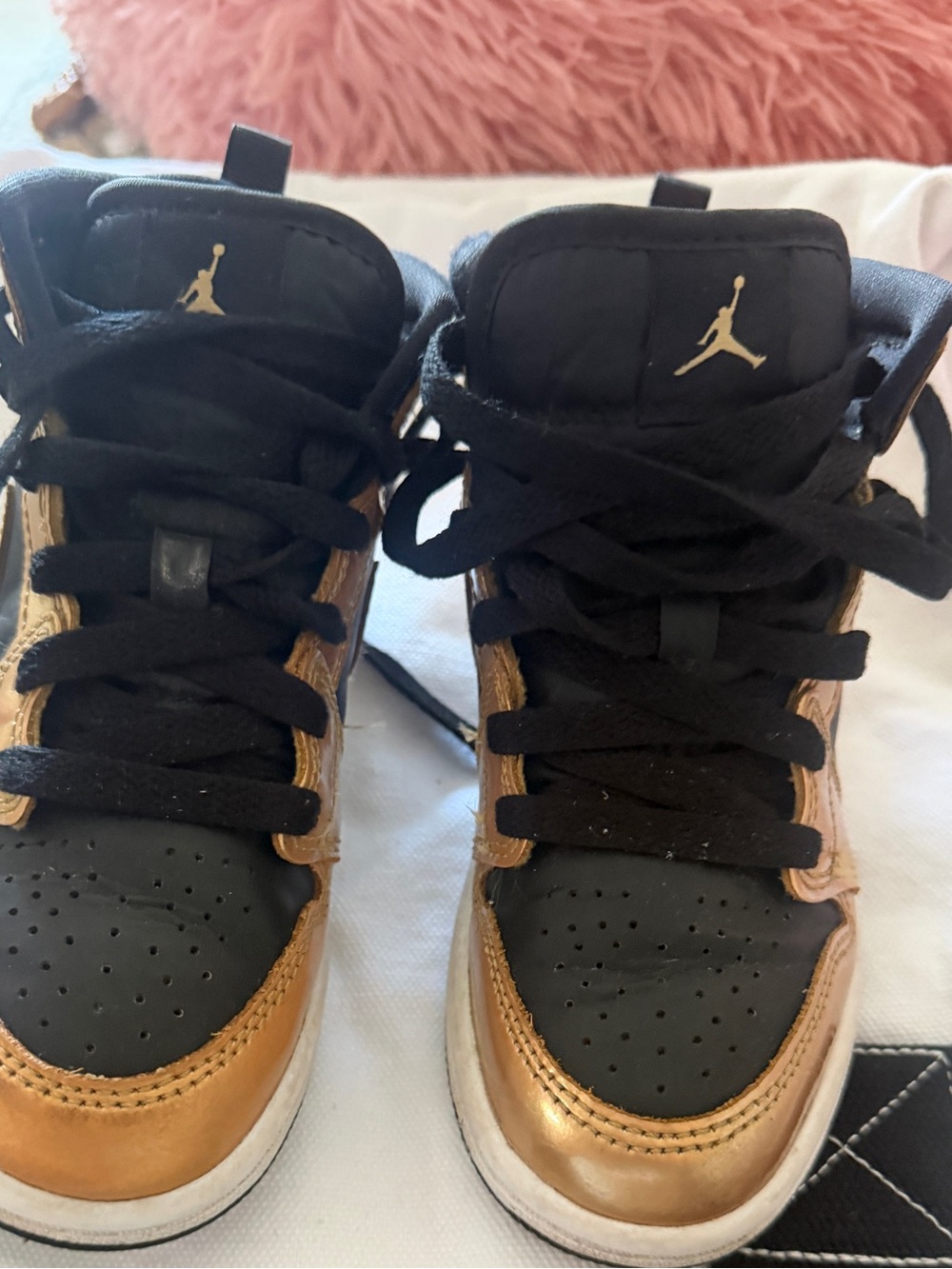 Jordan Black and Gold High-Top Sneakers